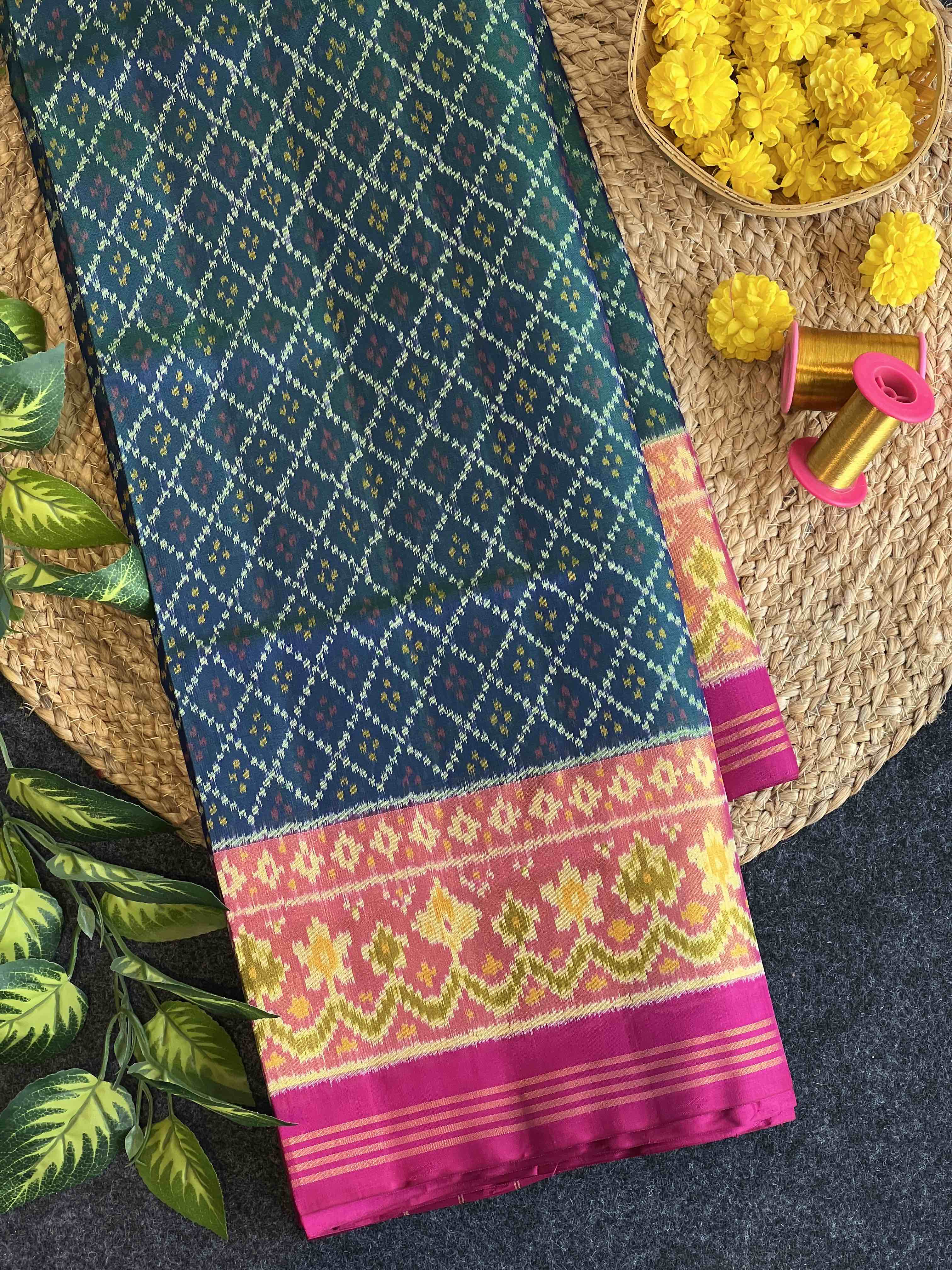 Button-ful Design Handwoven Patola Silk Saree Main image